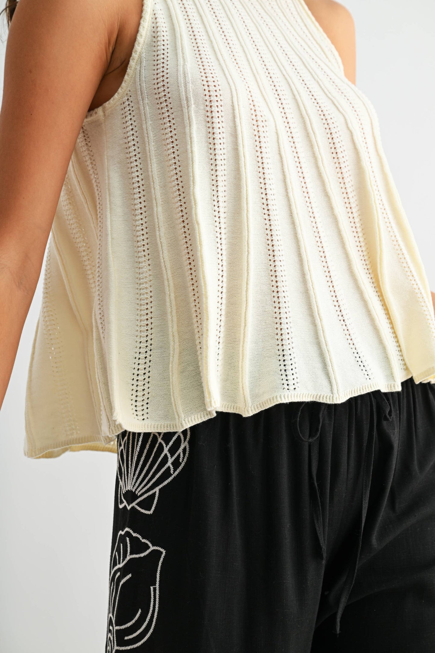 Sleeveless Knit Top with Flared Hem