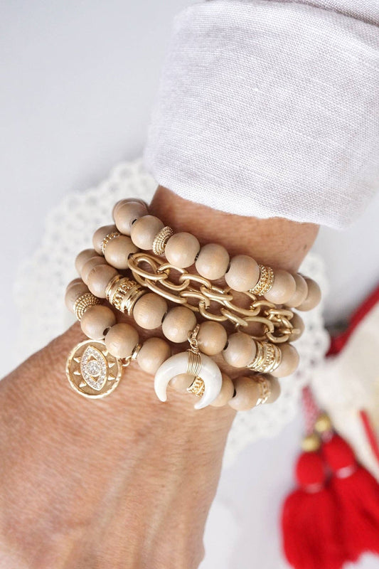 Boho chic bracelet stack with evil eye and moon charms